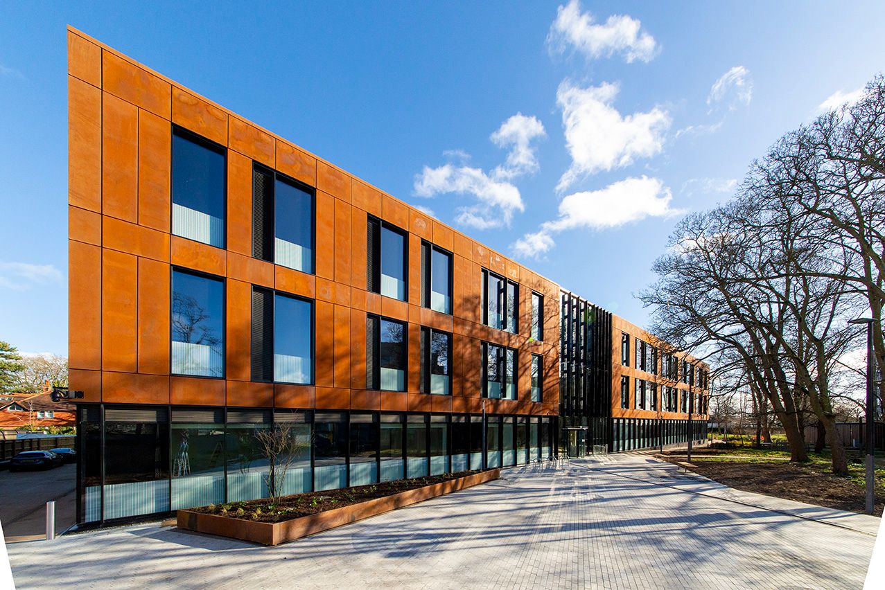 Dynamic angled photograph of the front of the IDRM building